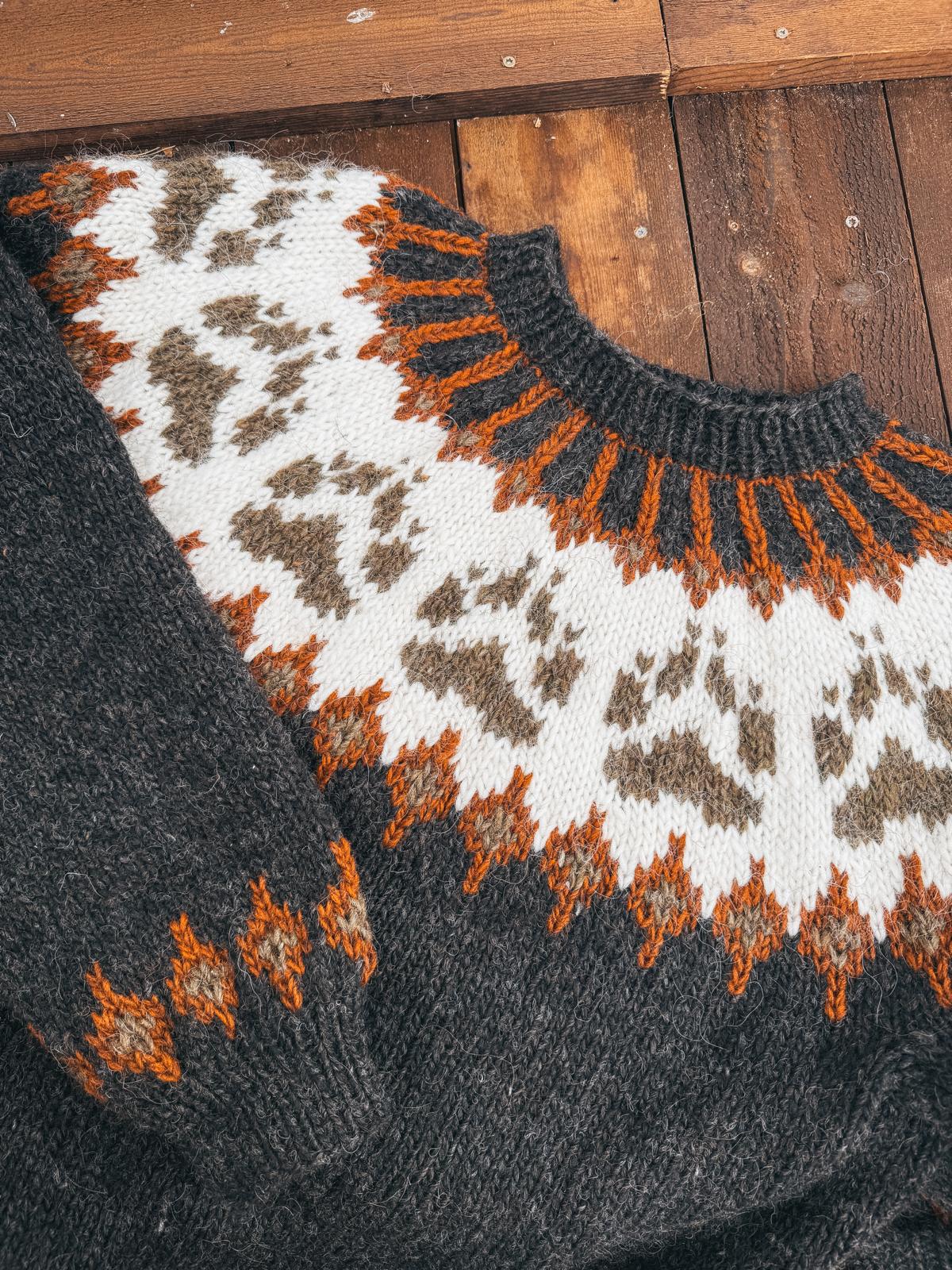 Villmarksgenseren black heather og highland green