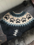 Villmarksgenseren sort tweed