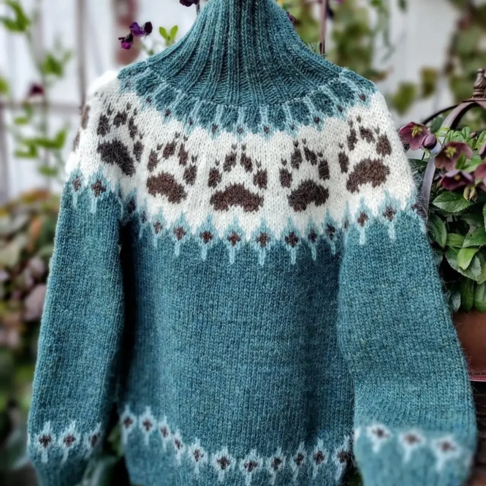 Villmarksgenseren teal og chocolate heather villmarksgenser av Linka Neumann